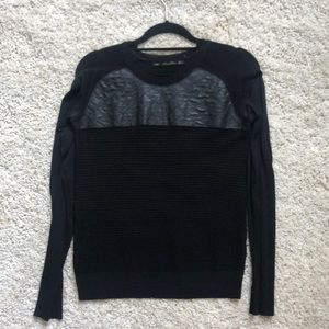 Knit with faux leather details